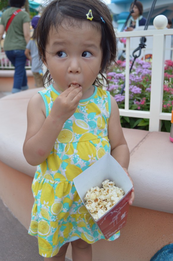 Little Mahina enjoying Jalapeno & Cheese popcorn. 
